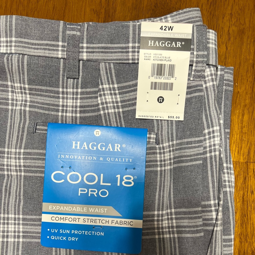 42W Haggar Shorts. Tags still on the shorts. Grey and white plaid.